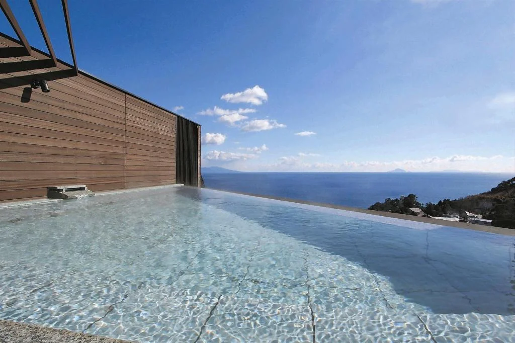 Open-air bath with sea views at Atagawa Prince Hotel